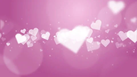 Abstract festive pink background with shapes of love hearts in the middle. 스톡 동영상 254406410