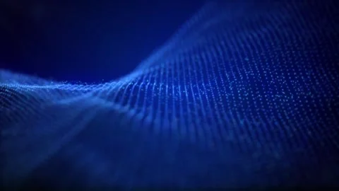 Abstract field of blue particle waves on a dark background, looped video Stock Footage 253580872