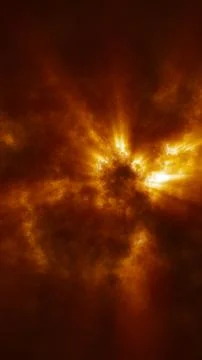 Abstract fiery cloud formation with bright golden rays of light emerging from イラスト素材