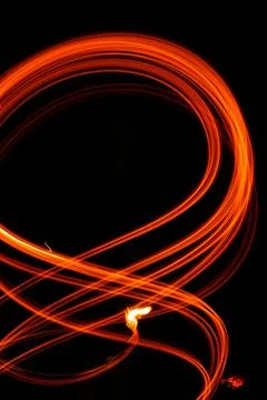 Abstract fiery pattern in the shape of the number 8. Drawing shapes with fire 写真素材