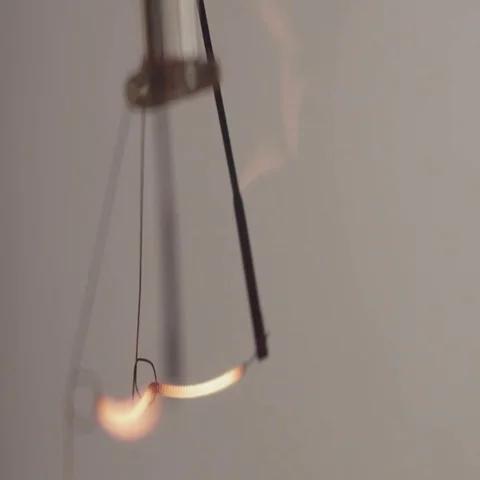 Abstract filament of lightbulb glowing Stock Footage 69491406