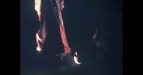 Abstract fire and flames on black background, retro 8mm film strip burning Stock Footage 329562812