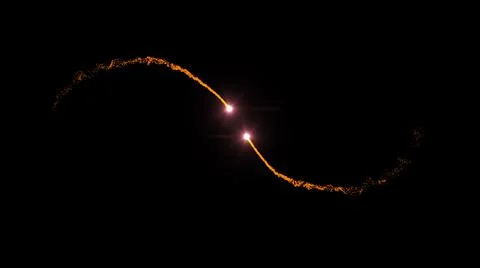 Abstract fire particles or fire explosions with moving light trials . Stock Illustration