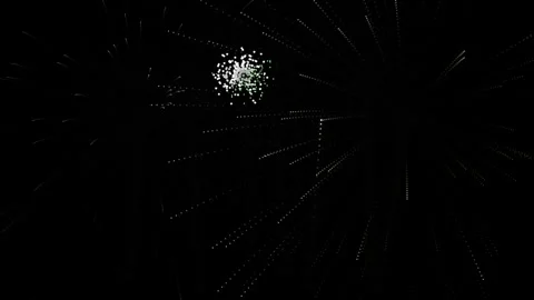 Abstract fireworks display featuring rhythmic glowing light trails isolated.. Stock Footage 345169231