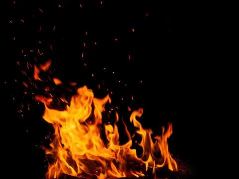 Abstract flame of fire from a campfire on a black background Stock Photos