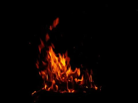 Abstract flame of fire from a campfire on a black background Stock Photos