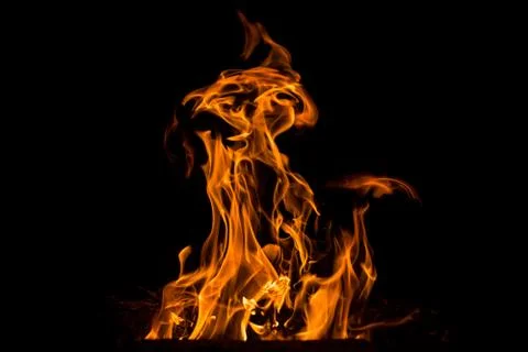 Abstract Flame. Natural element on the black background. Stock Photos