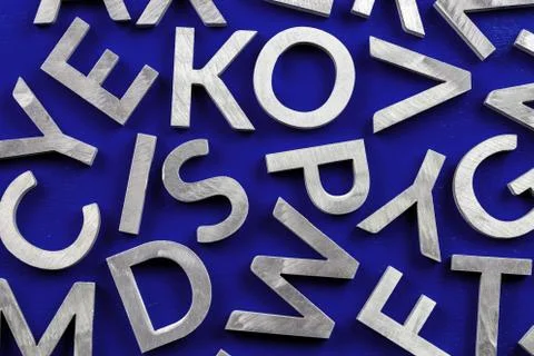 Abstract flat background of silver metal english alphabet characters on phantom Stock Photos