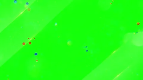 Abstract floating particles on vibrant green background with diagonal light Stock Footage 338177862