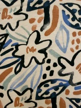Abstract Floral Fabric Pattern Featuring Stylized Leaves and Dots in Earthy.. Stock Photos