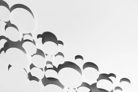 Abstract flow of white simple flying ovals in hard light with contrast strict Stock Photos