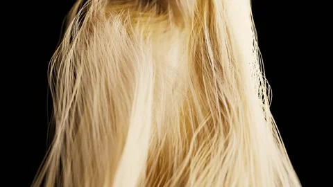 Abstract flowing golden particles creating a shimmering cascade against a d.. Vidéo 327345183