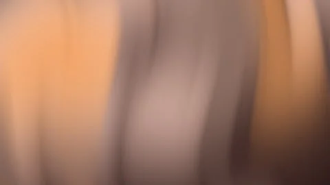 Abstract flowing gradient background with warm orange and brown tones Stock Footage 327253633