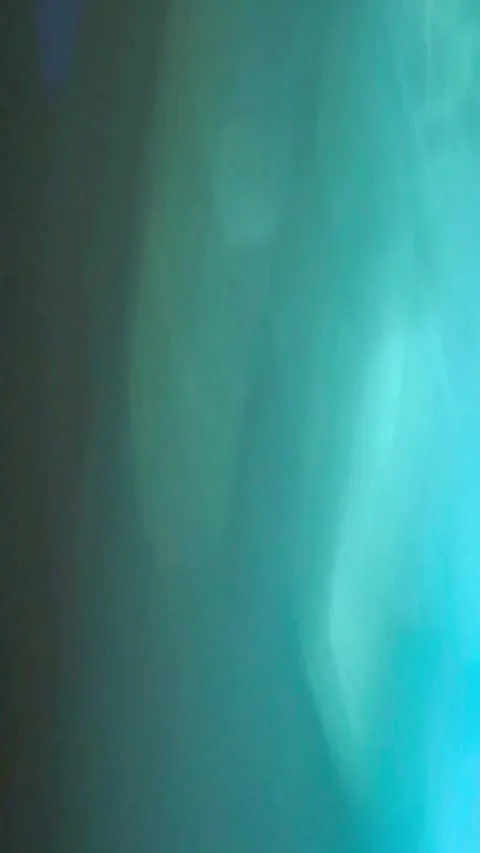 Abstract flowing light motion with vibrant blue and green hues Видео 339778672
