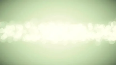 Abstract flowing light particles on soft green background Video stock 336101599