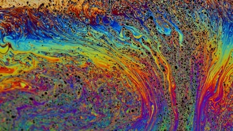 Abstract flowing liquid color waves in motion. Vibrant dynamic particle swirls f Stock Footage 340456689