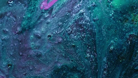 Abstract flowing liquid texture in motion. Dynamic swirling ink patterns with vi 库存影片 340450134