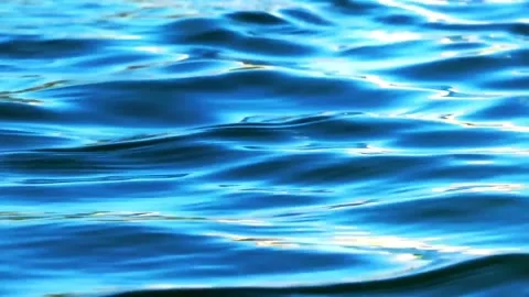 Abstract flowing water waves in vibrant blue tones. Dynamic liquid motion with s 動画素材 340450151