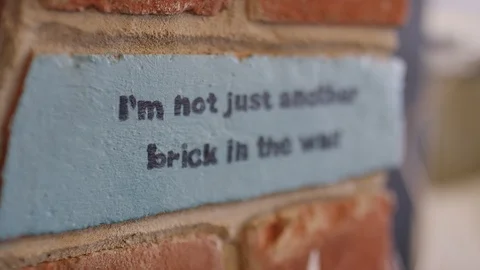 Abstract focus pull of a brick in a cafe, in slow motion Video stock 92813604