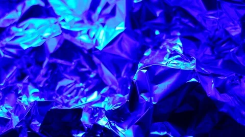 Abstract foil in changing lights of all spectrum Stock Footage 87888626