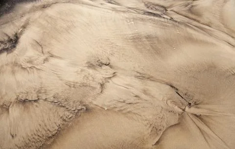 Abstract free designs pattern of wet coastal sand Stock Photos