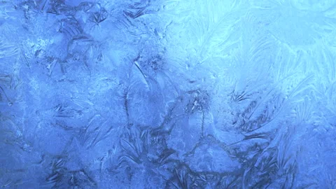 Abstract frosty pattern on glass, background texture on the window Stock Footage 208941233