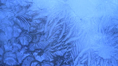 Abstract frosty pattern on glass, background texture on the window Stock Footage 211001390