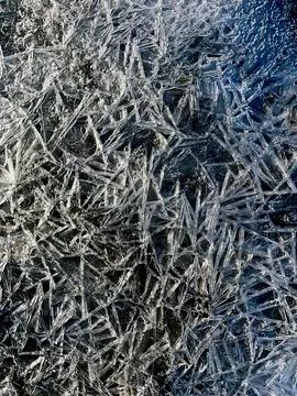 Abstract frozen ice texture with sharp crystal patterns Stock Photos