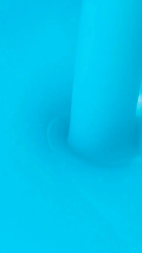 Abstract full frame background of blue liquid soap texture with micro bubbles. Stock Footage 336952765