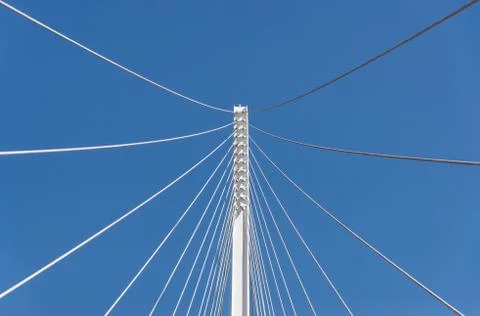 Abstract geometric architectural elements of a bridge against blue sky. Foto stock
