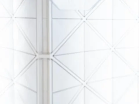 Abstract geometric architecture background featuring blurred modern buildin.. Stock Photos