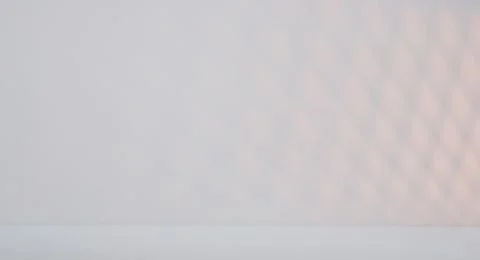 Abstract geometric background with a soft gradient from white to light blue. Stock Photos