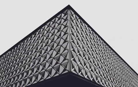 Abstract geometric background with triangles and buildings cells 스톡 사진