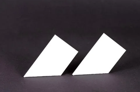 Abstract geometric composition of white quadrangles on a gray background. Two Stock Photos