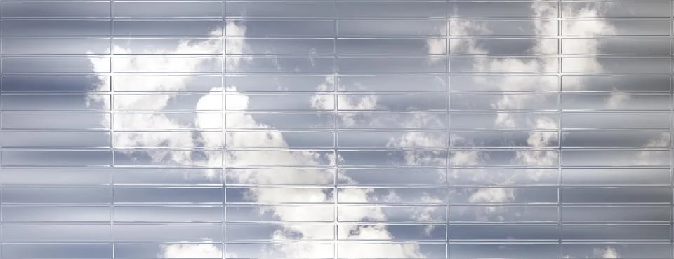 Abstract geometric glass panel wall reflecting blue sky and white clouds, w.. Stockillustratie