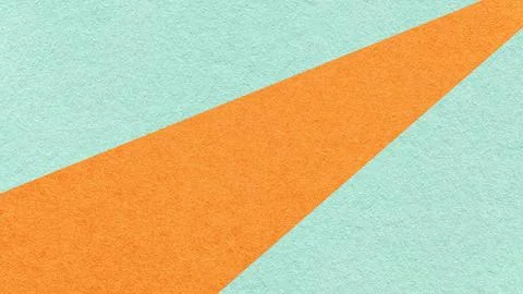 Abstract geometric light mint paper background with orange ray, macro textu.. Foto stock