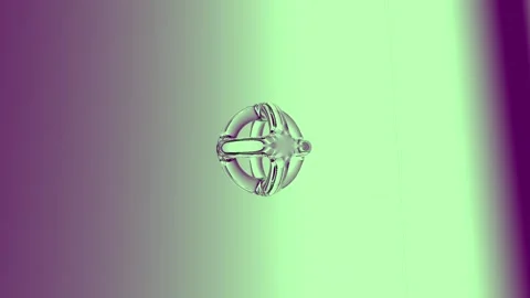 An abstract geometric object with a gradient design, showcasing green and p.. Stock Footage 305454141