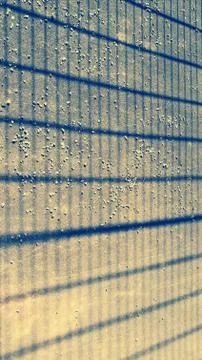 Abstract geometric pattern with blue lines on golden background Stock Photos