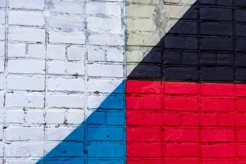 Abstract geometric pattern on brick wall Stock Photos