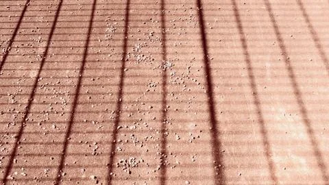 Abstract geometric pattern with dark lines on pink background Stock Photos