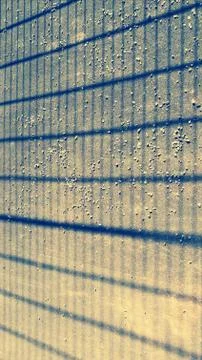 Abstract geometric pattern with grey lines on yellow background Stock Photos