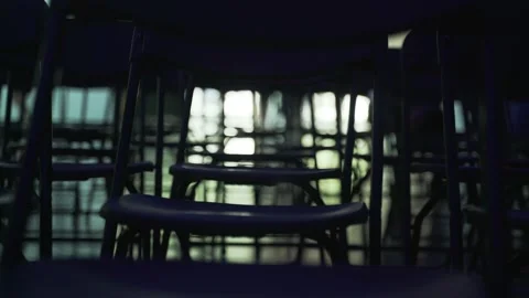 An abstract geometric pattern made of even rows of chairs. Silhouettes of chairs Stock Footage 194422445