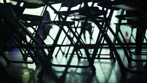 An abstract geometric pattern made of even rows of chairs. Silhouettes of chairs Stock Footage 195088443