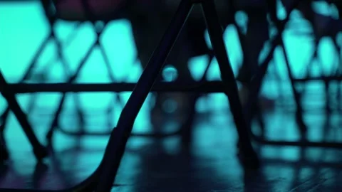 An abstract geometric pattern made of even rows of chairs. Silhouettes of chairs Stock Footage 195088469