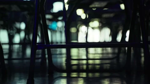 An abstract geometric pattern made of even rows of chairs. Silhouettes of chairs Stock Footage 202533753