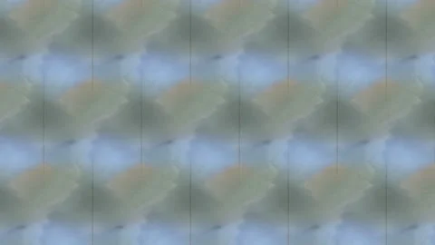 An abstract geometric pattern with a textured, gray surface. The repeating .. Stock Footage 305524665