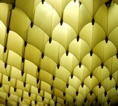 Abstract geometric regular luminous light yellow with dark shadows texture Stock Photos