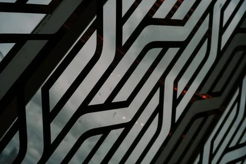 Abstract geometrical design pattern of decorative metal grille element Stock Photos