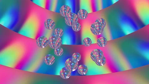 Abstract glass spheres orbiting within a flowing spectrum vaporwave gradient Stock Footage 167416706