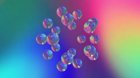 Abstract glass spheres orbiting within a flowing spectrum vaporwave gradient Stock Footage 168001463